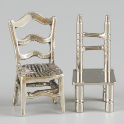 8-delig lot miniatuur stoelen zilver.