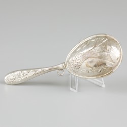 Rammelaar zilver.