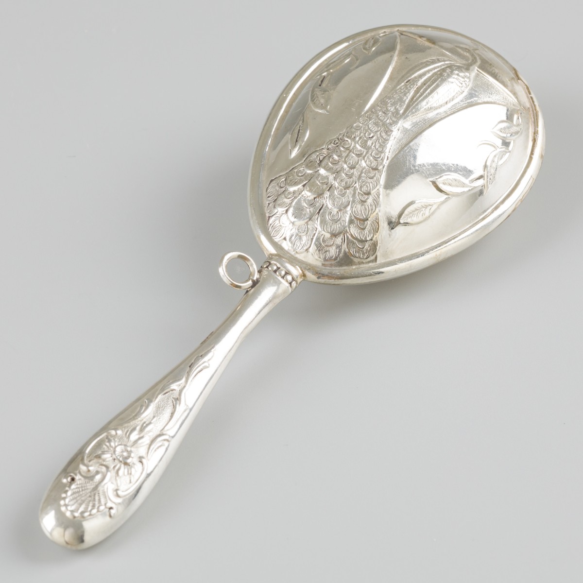 Rammelaar zilver.