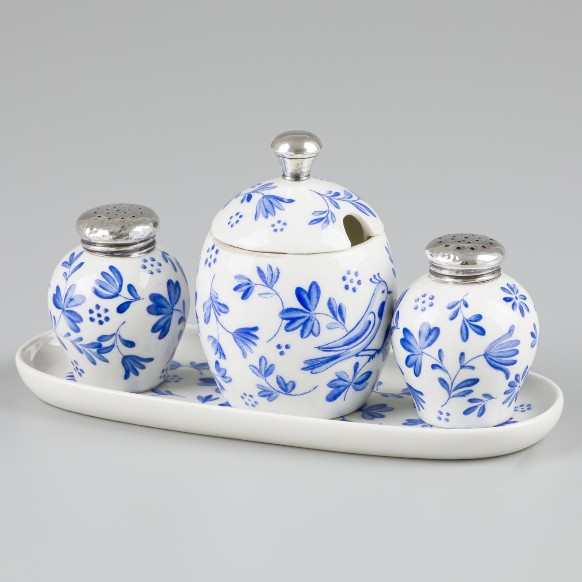 Condiment set (Rosenthal porselein) zilver.