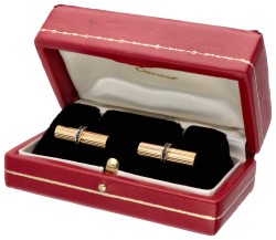 Vintage Cartier 18 kt. geelgouden bar manchetknopen bezet met saffier.