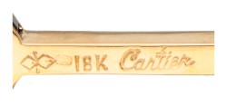 Vintage Cartier 18 kt. geelgouden bar manchetknopen bezet met saffier.