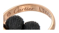 Cartier 18 kt. tricolor gouden 'Trinity' armband met een zwart koord.