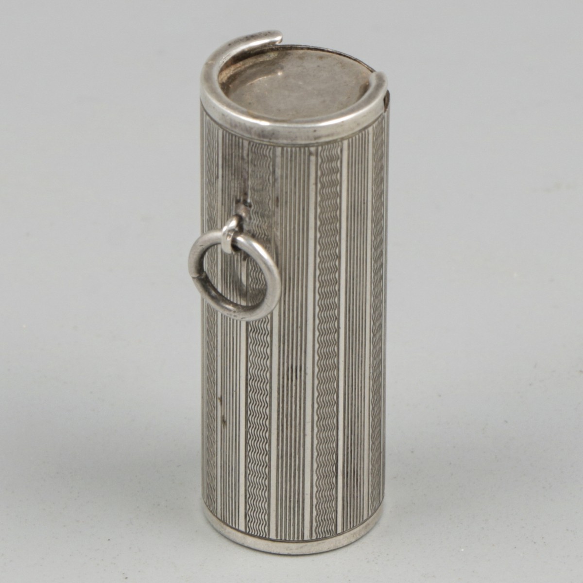 Muntendispenser zilver.