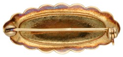 Antieke 14 kt. geelgouden broche voorzien van gegraveerde details.