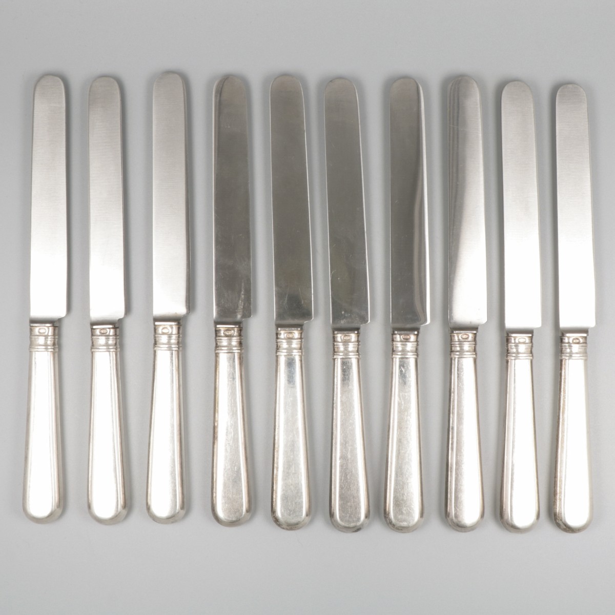 10-delige set dinermessen zilver.