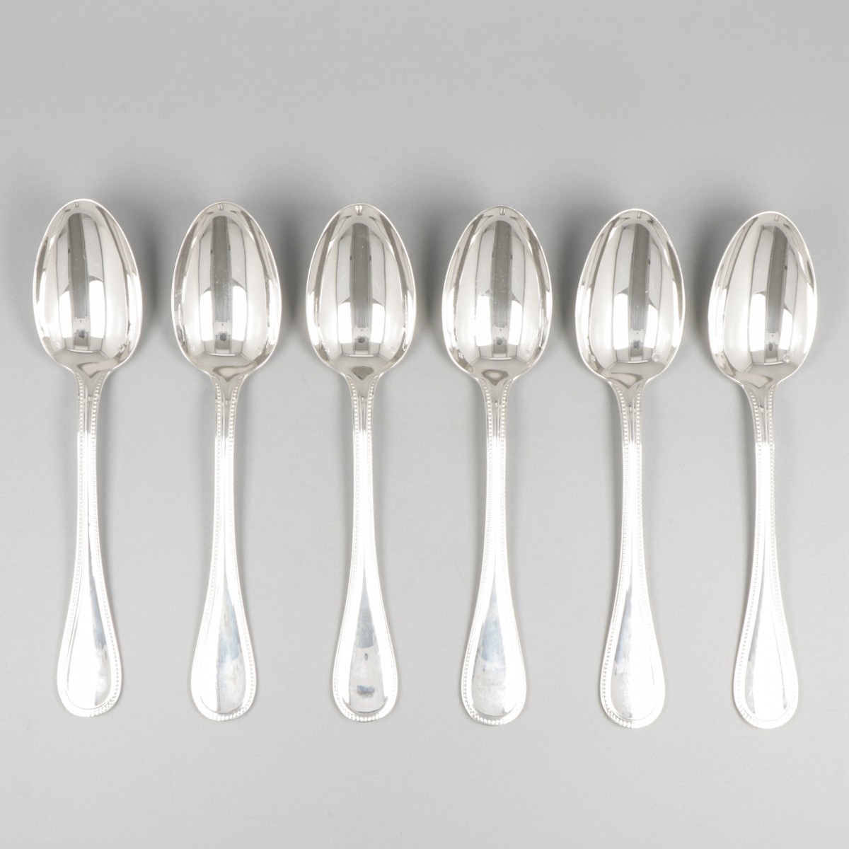 6-delige set dessertlepels Christofle Sterling, model Perles, zilver.