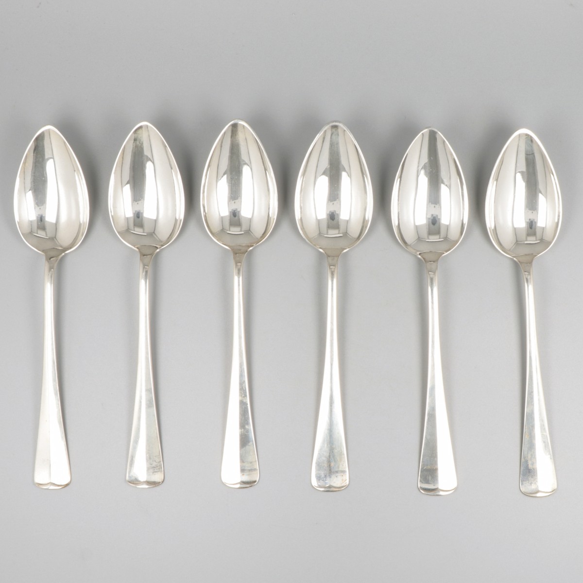 6-delige set dinerlepels Haags lofje zilver.