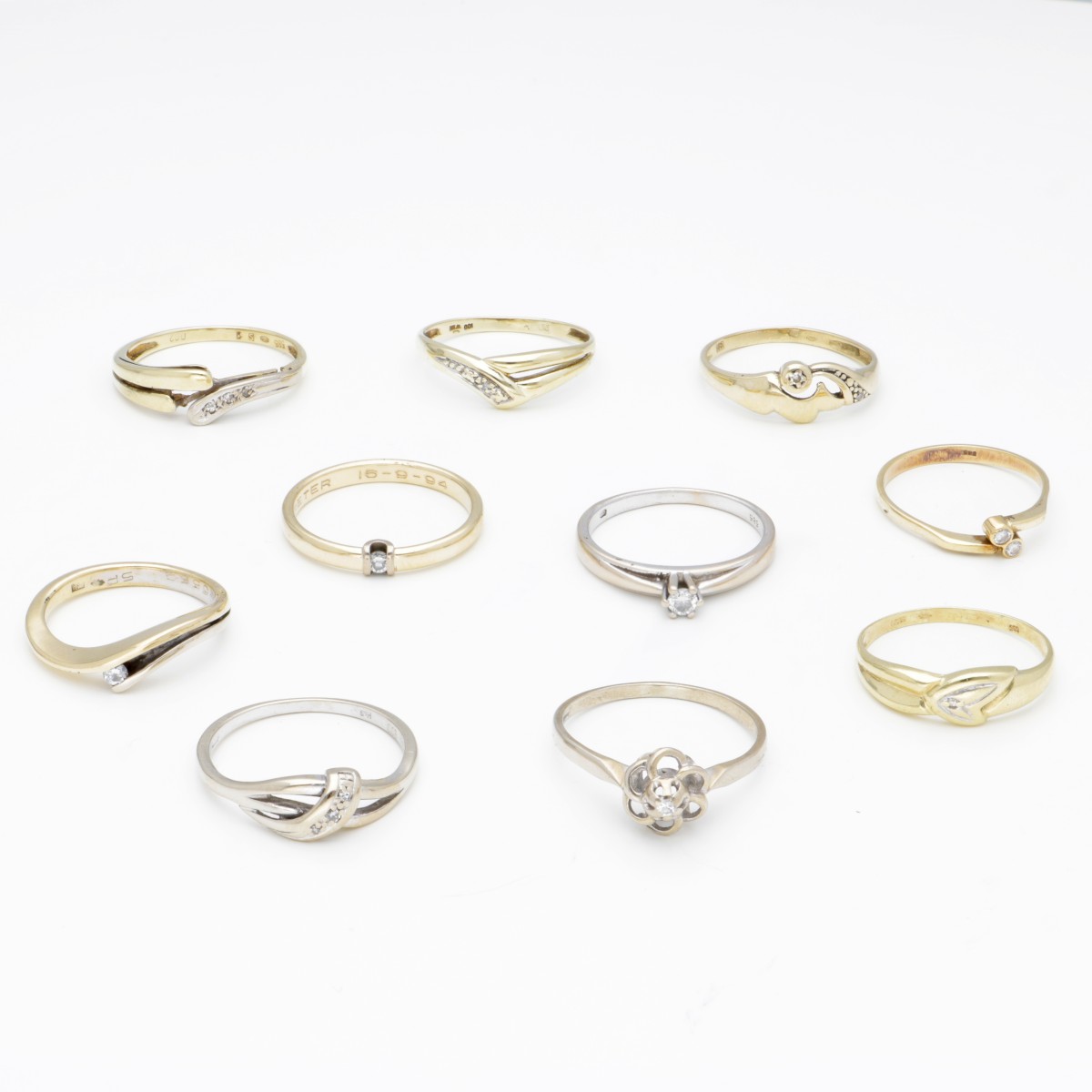 Lot van 14 kt. gouden ringen, waarvan aantal bezet met diamant.