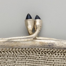 Beugeltas zilver.