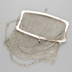 Beugeltas zilver.
