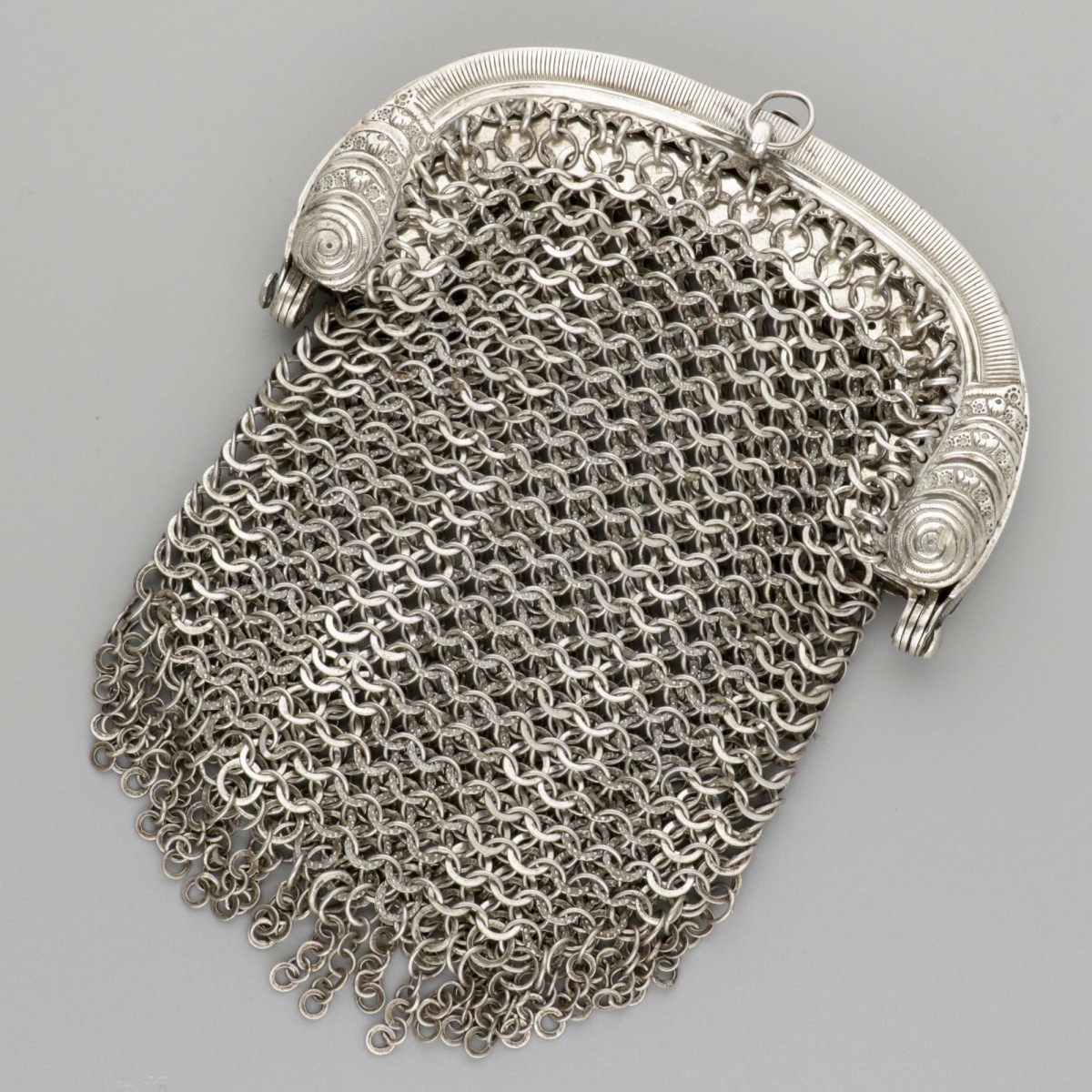 Beugelbeurs (1850) zilver.