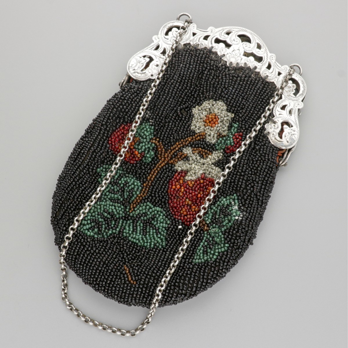 Beugeltas zilver.