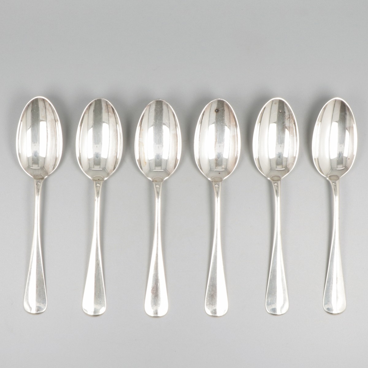 6-delige set ontbijtlepels zilver.