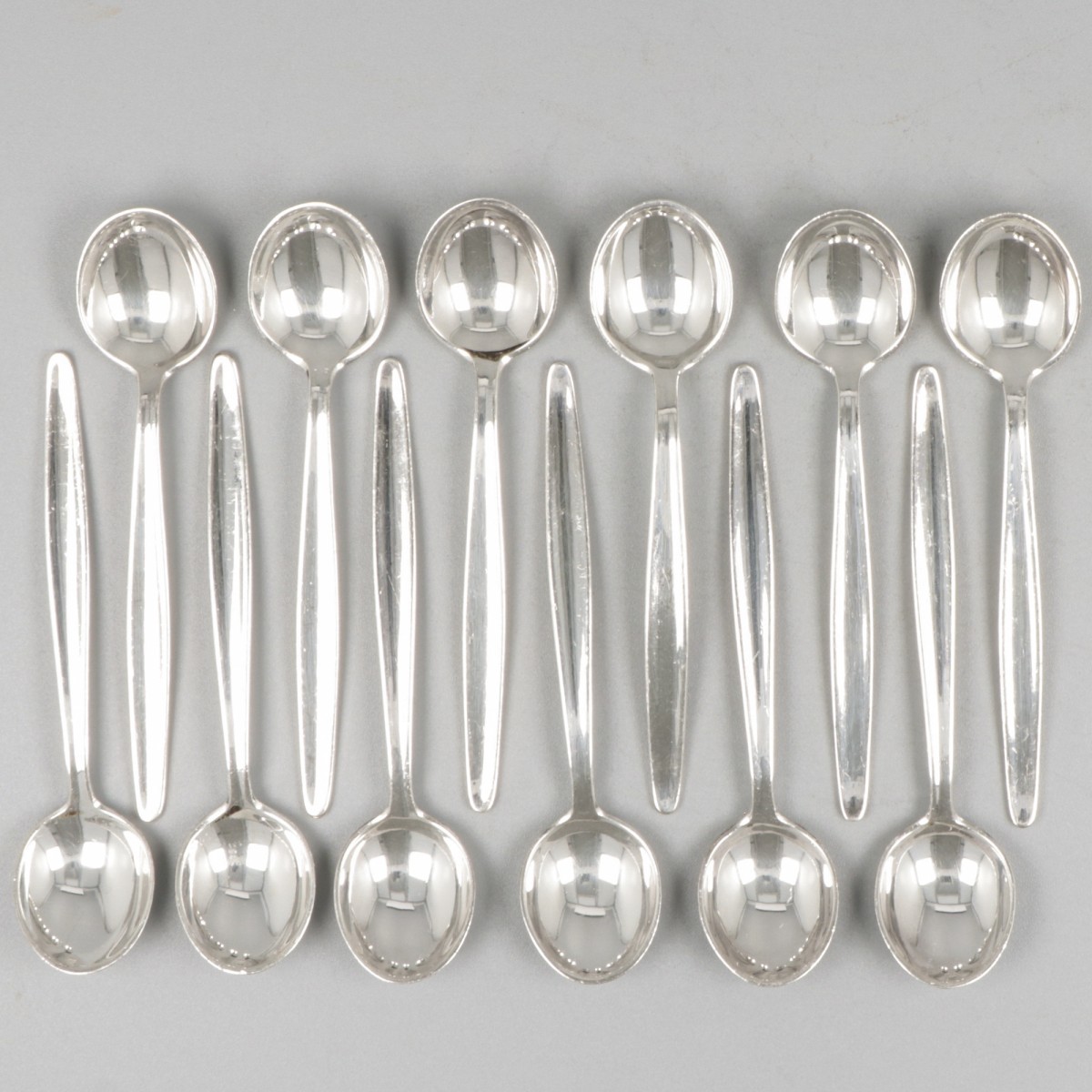 12-delige set theelepels ''model Jeunesse'' zilver.