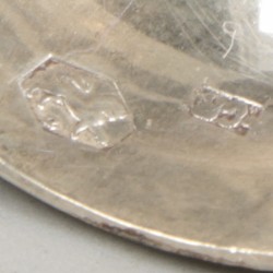 2-delig lot roomlepels zilver.
