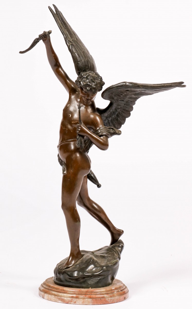 Een bronzen sculptuur van een putto, ca. 1900.