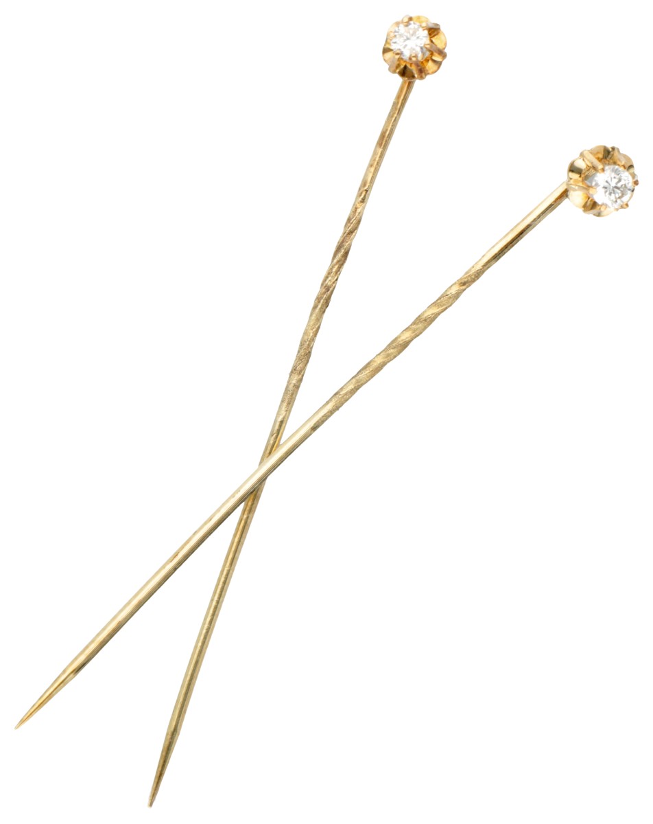 Set van twee 14 kt. geelgouden reversspelden bezet met ca. 0.10 ct. diamant.
