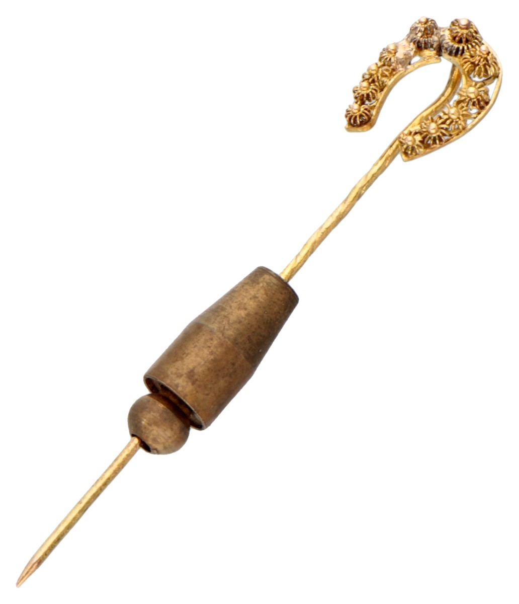 Antieke 14 kt. geelgouden reversspeld met een cantille hoefijzer.