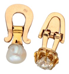 14 kt. Geelgouden boordknopen bezet met ca. 0.28 ct. diamant en parel.
