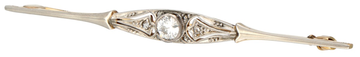 14 kt. Bicolor gouden art deco staafbroche bezet met ca. 0.20 ct. diamant.