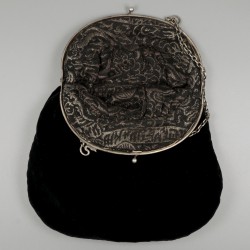 Beugeltas zilver.