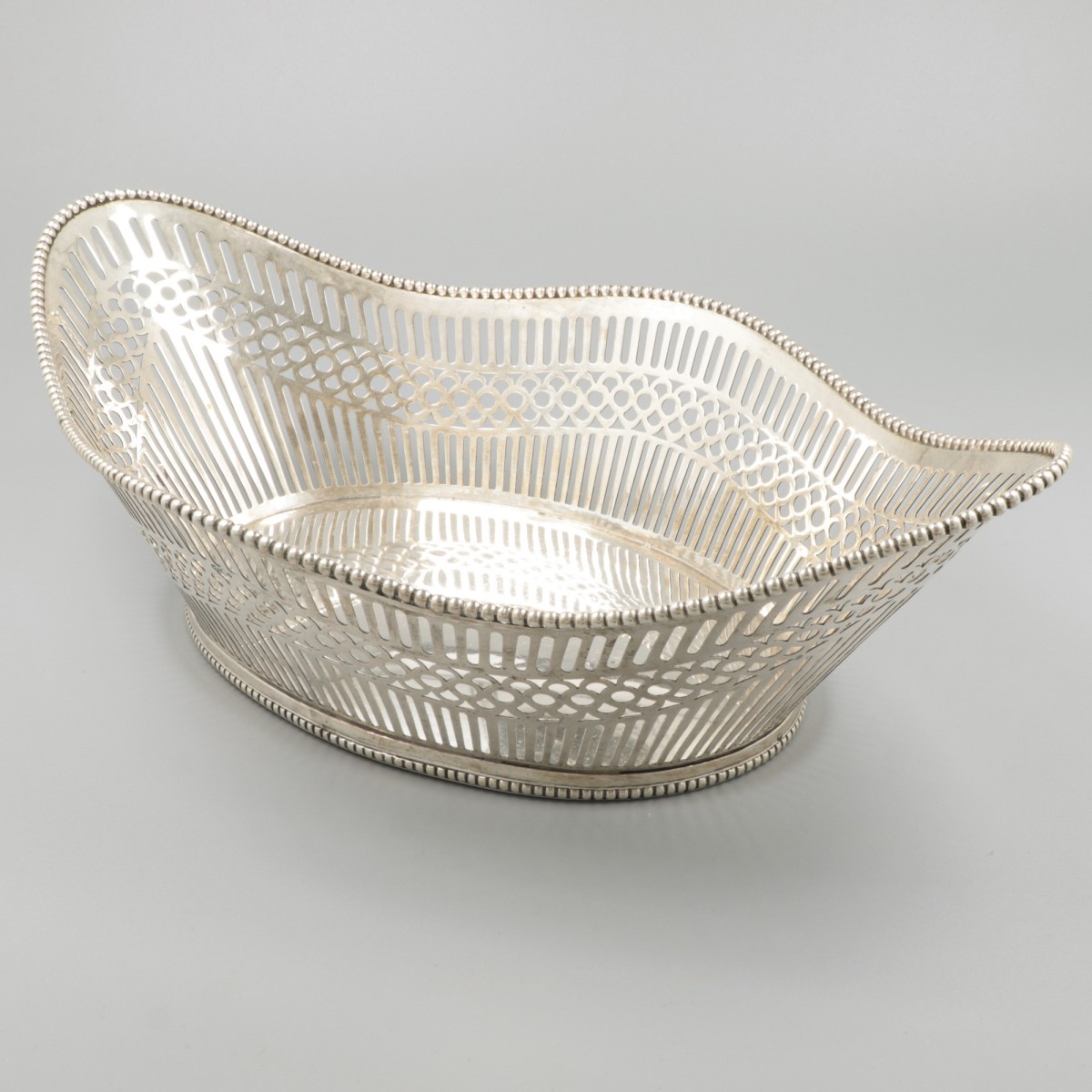 Broodmand zilver.