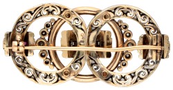 Portugese 18 kt. gouden / zilveren broche bezet met diamant en robijn.