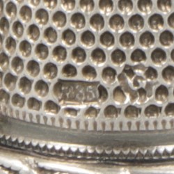 12-delig lot vingerhoedjes zilver.