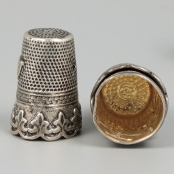 12-delig lot vingerhoedjes zilver.