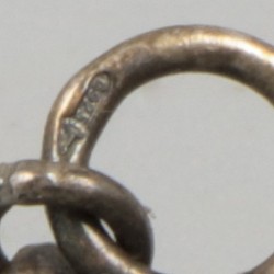Jasseron ketting met breipendoppen zilver.