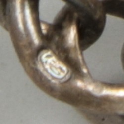 Jasseron ketting met breipendoppen zilver.