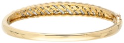 18 kt. Geelgouden bangle armband bezet met ca. 1.07 ct. diamant.