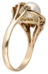 Vintage 14 kt. geelgouden ring bezet met ca. 0.22 ct. diamant en een parel.